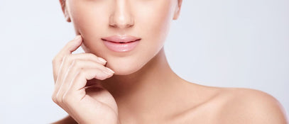 A woman posing for a photograph